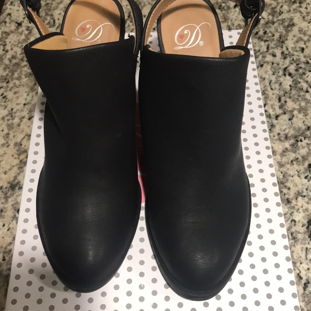 Black Sling back mules. Brand new, NEVER WORN.